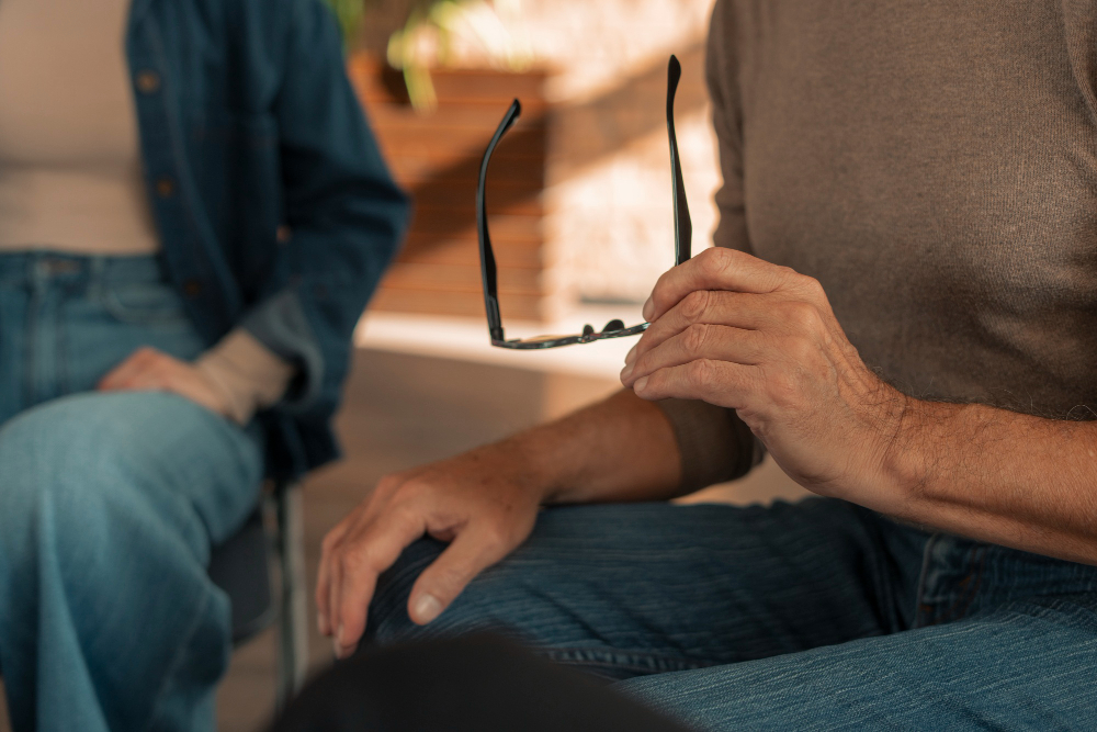 People participating in a psychological support group during drug addiction treatment in Mount Pleasant, WI.