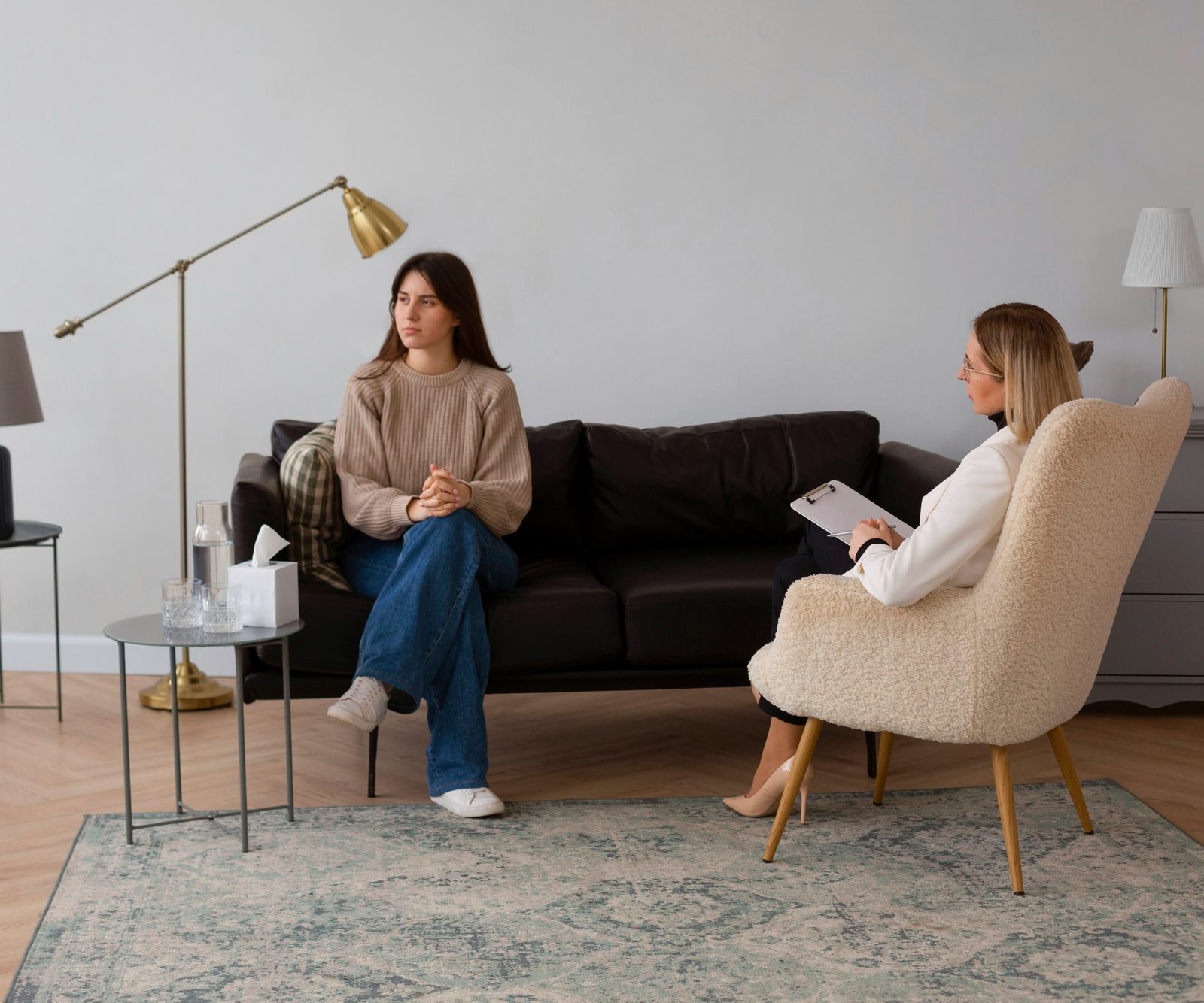 Woman speaking with her therapist during personalized behavioral health services in Mount Pleasant, WI.